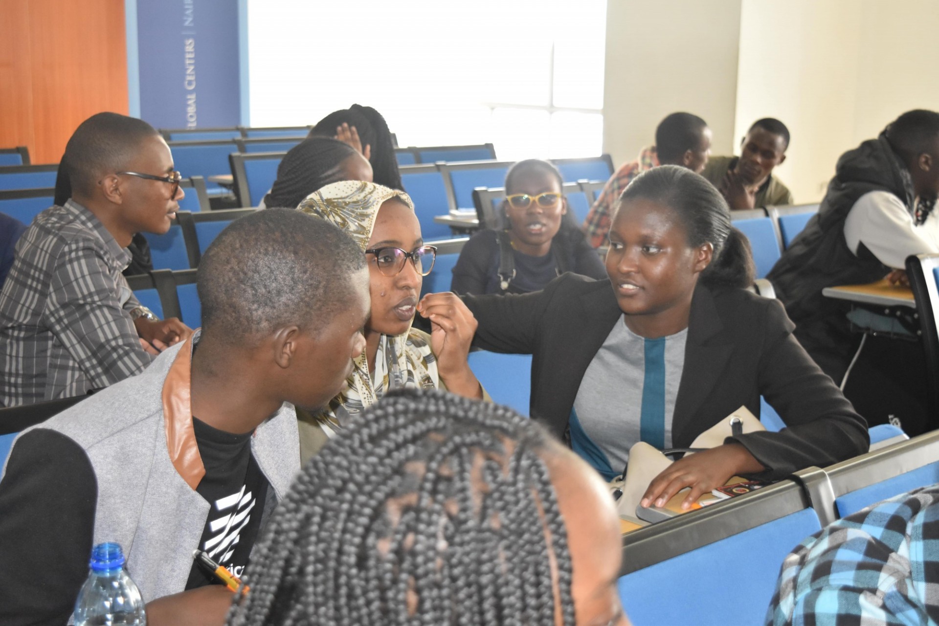 Kenyan youth involved in discussions during the workshop