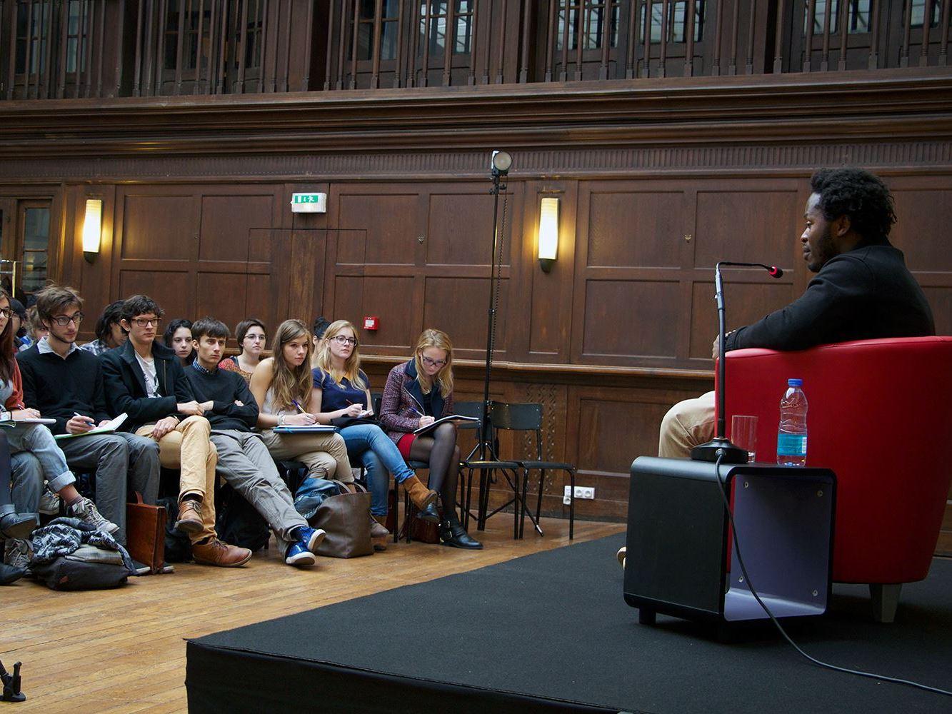 Ishmael Beah speaks with students