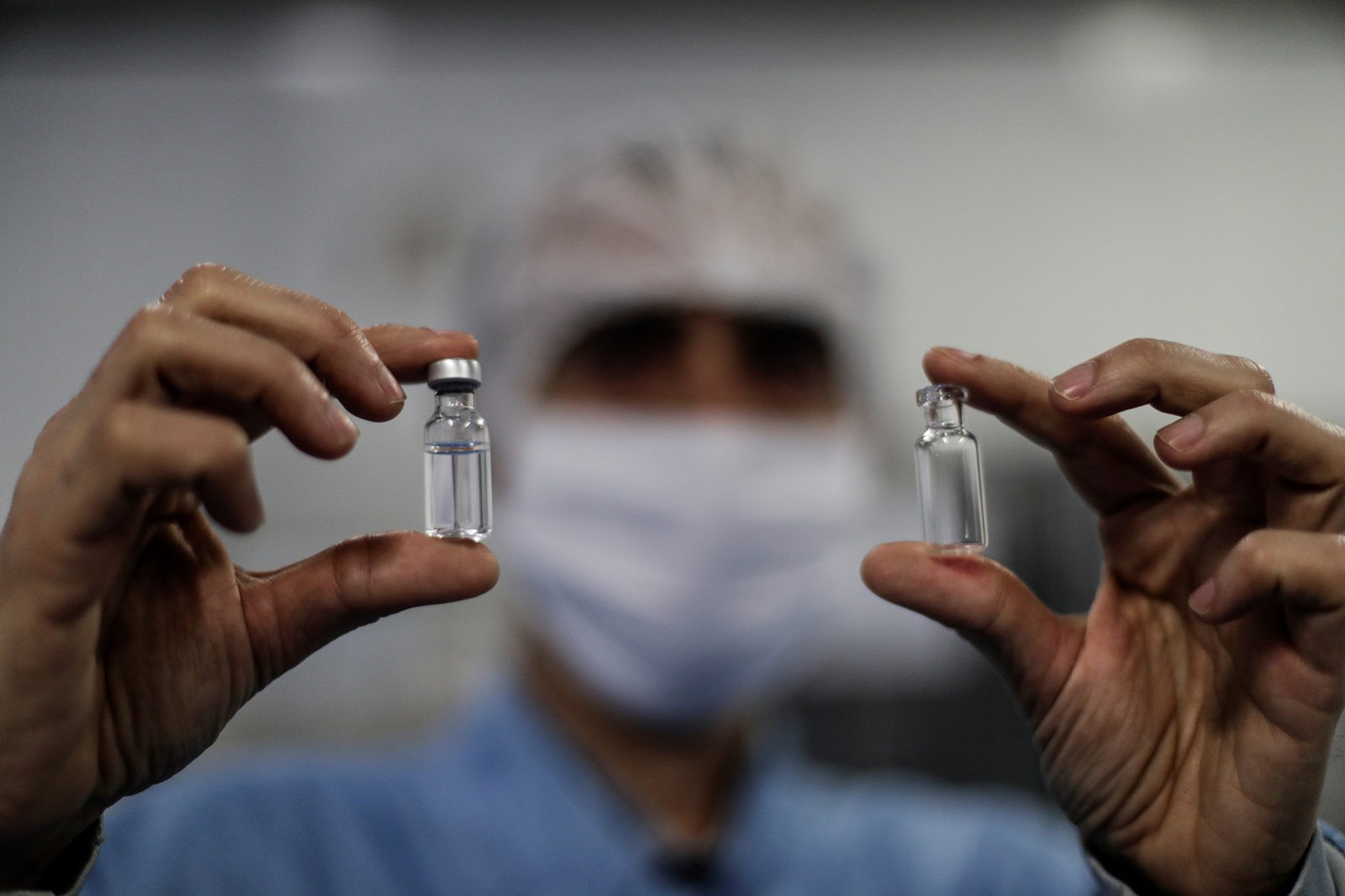 Two virals with vaccine samples, in the laboratory of BioManguinhos, the institute for the production of immunobiological of the Oswaldo Cruz Foundation, in Rio de Janeiro, Brazil. (Photo: EPA-EFE / Antonio Lacerda