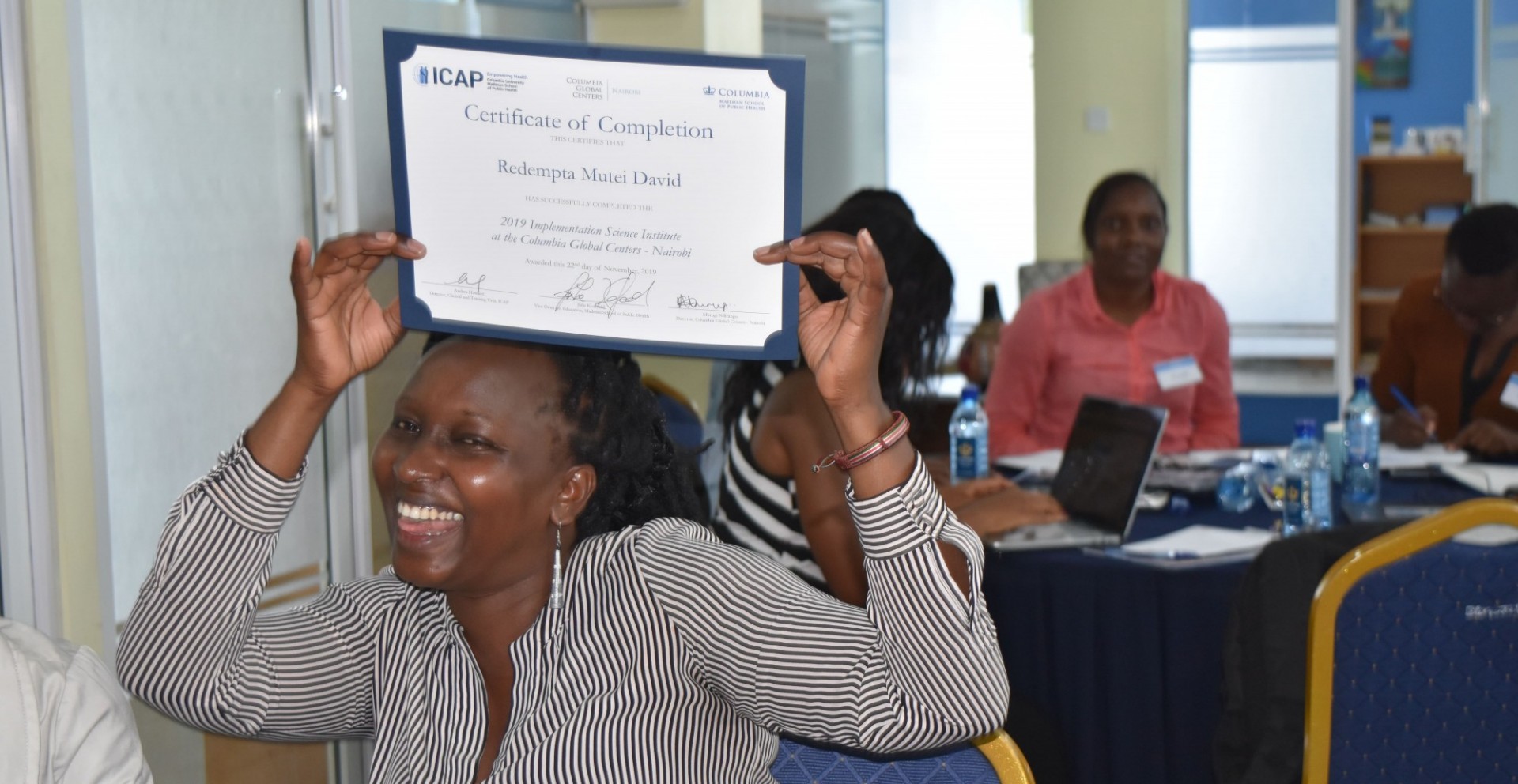 Excited Beneficiaries during the IIPAN Conference as they Received their Certificates.