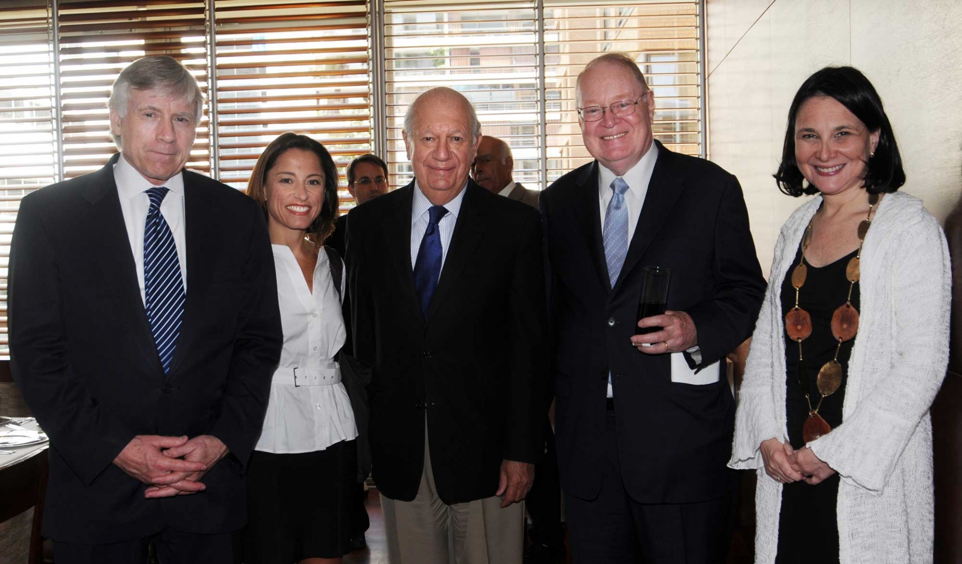 Columbia President Lee C. Bollinger, far left, with Karen Poniachik, far right, at the inauguration in 2011 of Columbia Global Centers | Santiago. Between them, from left, is Constanza Santa Maria, Columbia journalism, Ricardo Lagos, former president of Chile, and John Coatsworth, then University Provost. At the inaugural of Columbia Global Centers | Santiago