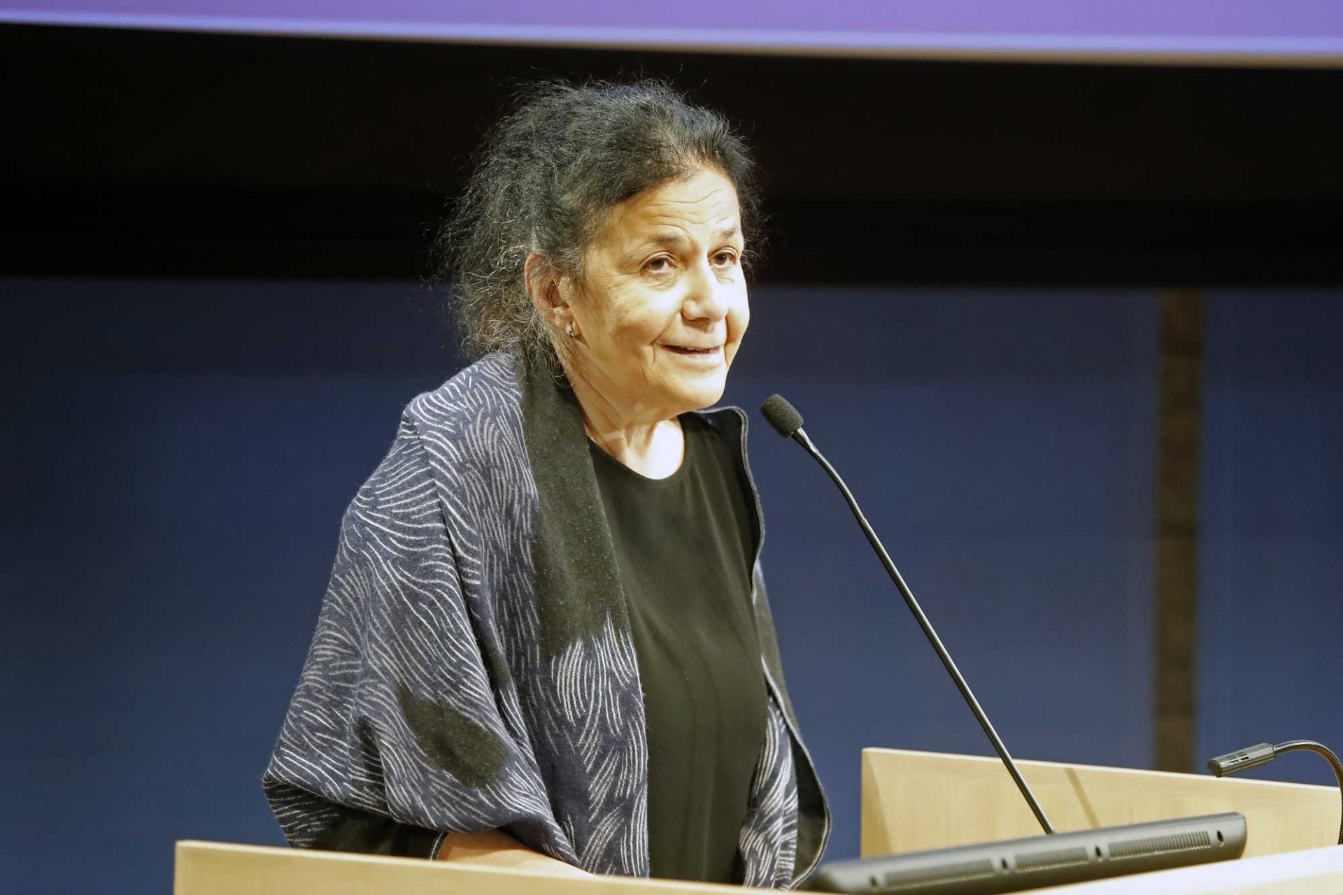 Wafaa El-Sadr, executive vice president of Columbia Global woman at podium