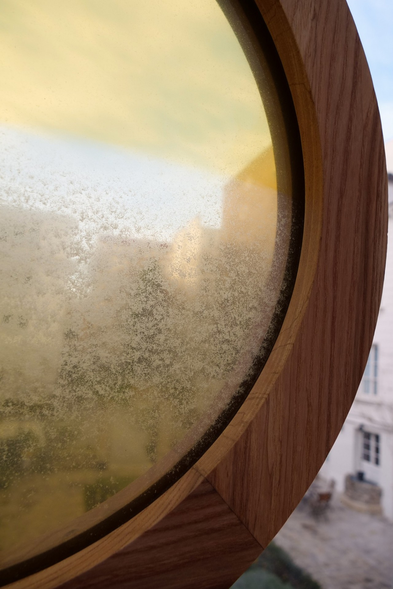 Details: The Honey Windows hanging in the glass veranda.