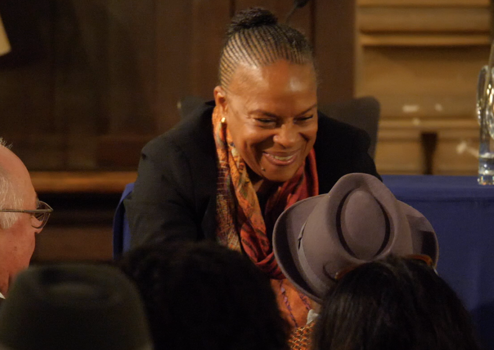 Christiane Taubira greets Maryse Condé in the Grande Salle Ginsberg-LeClerc.