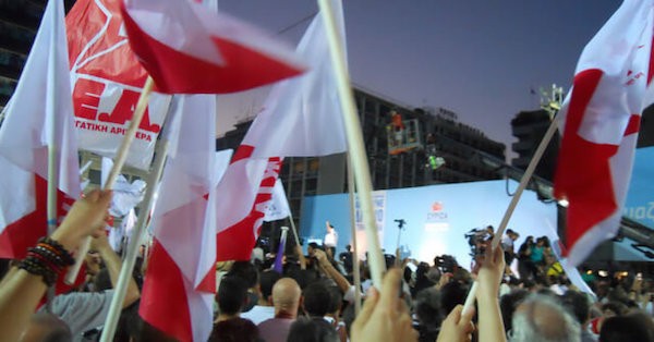 People holding flags at demonstration in Poland