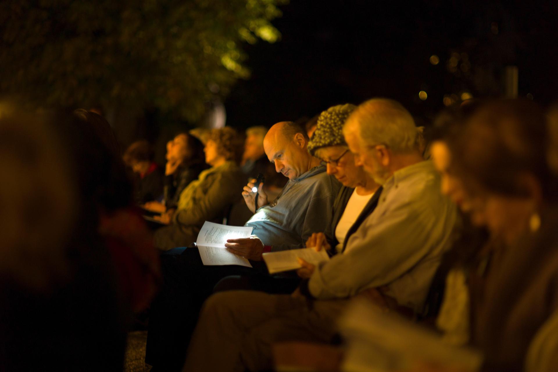 Opening night audience reading under the stars at the Irish Cultural Center