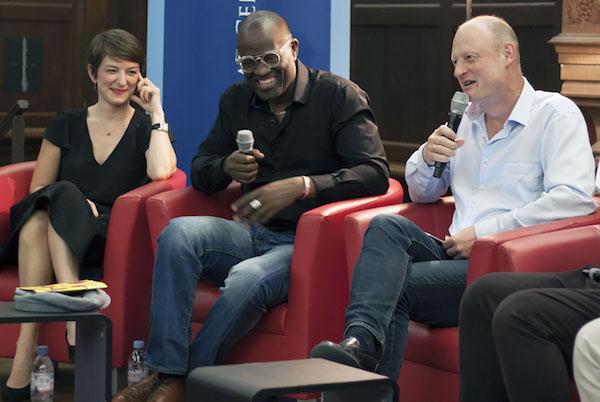 Writers talking on stage