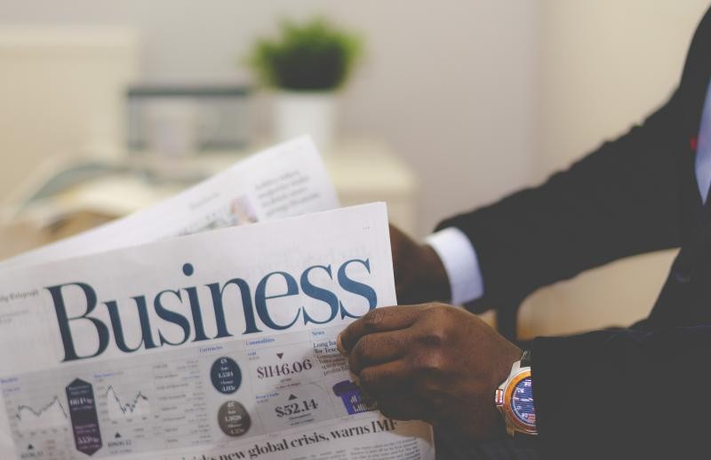 Man reading a business newspaper