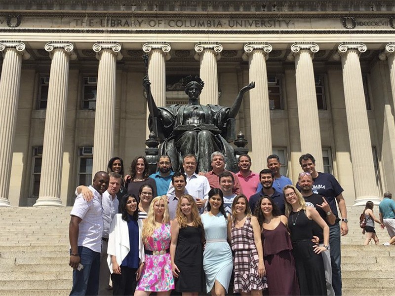 The Global EMPA class of 2017 in front of Alma Mater on campus, in New York. Monica Vianna is in the front, wearing a plaid dress. Photo: Maria Luiza Paranhos The Global EMPA class of 2017 in front of Alma Mater on campus, in New York. Monica Vianna is in the front, wearing a plaid dress. Photo: Maria Luiza Paranhos