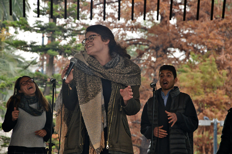 Pizmon performing at Plaza de Armas; Santiago