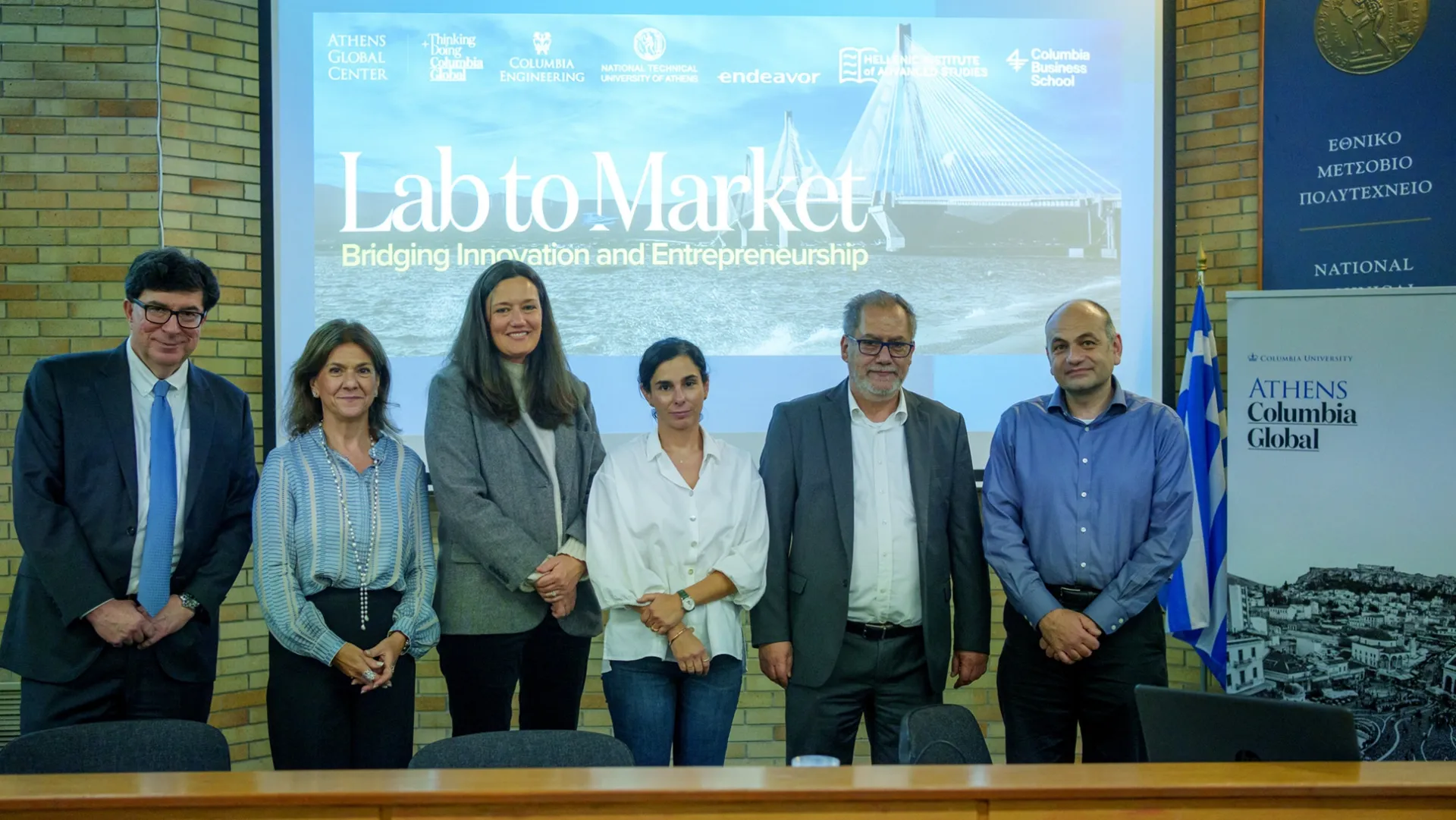 Lab to Market information session presenters standing at event.