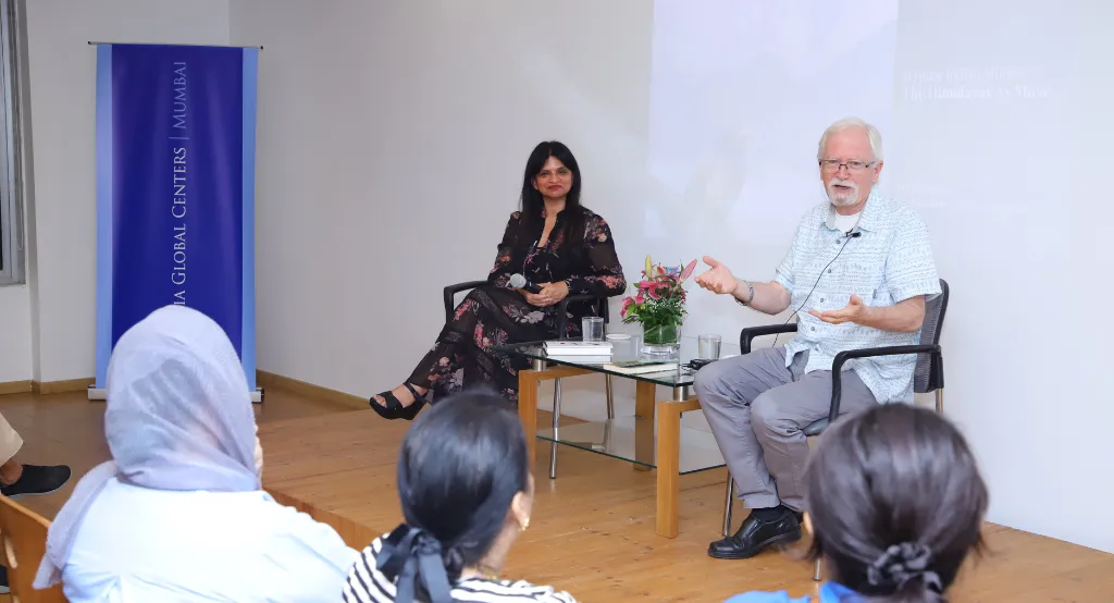 Speakers conversing with the audience