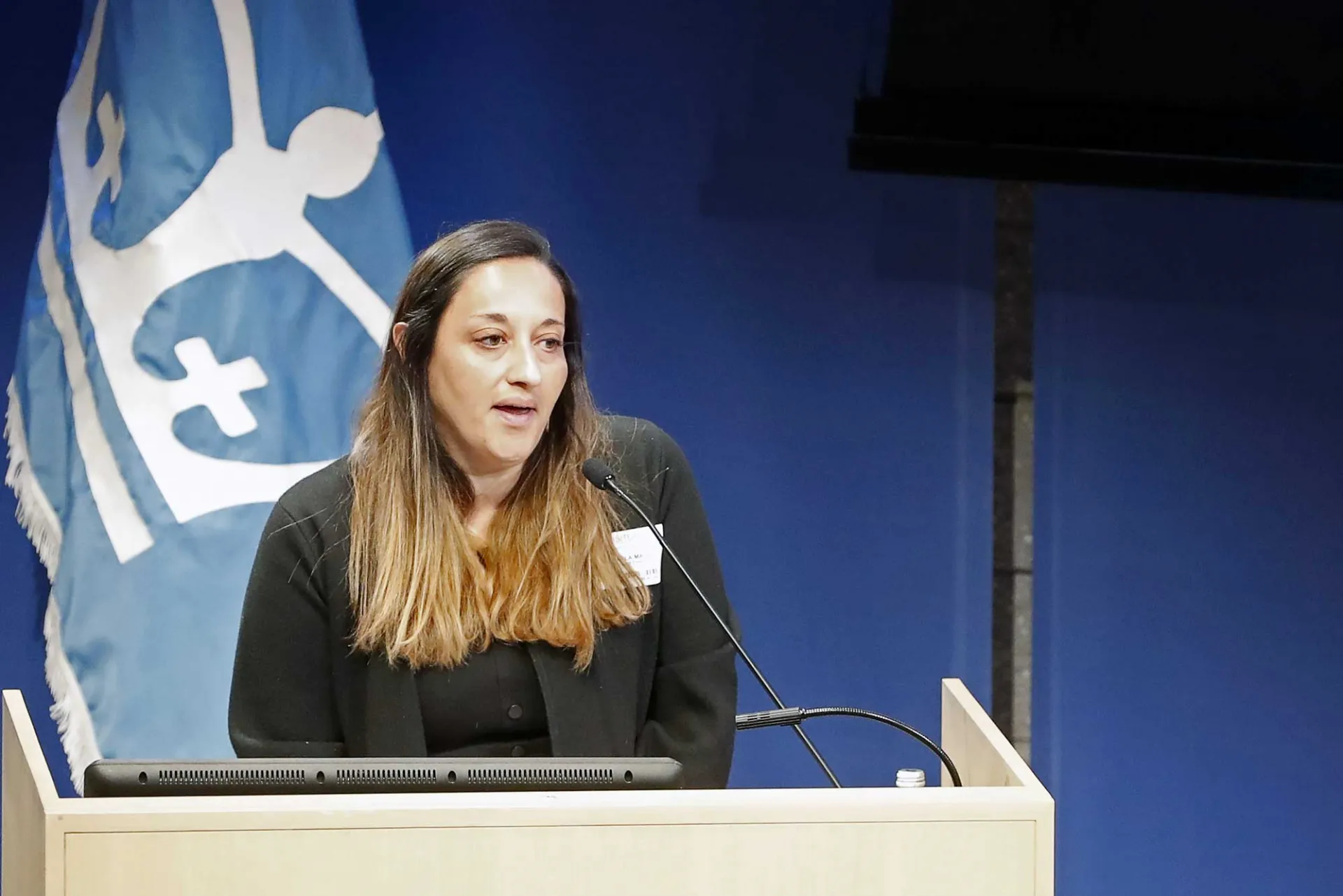 woman at podium