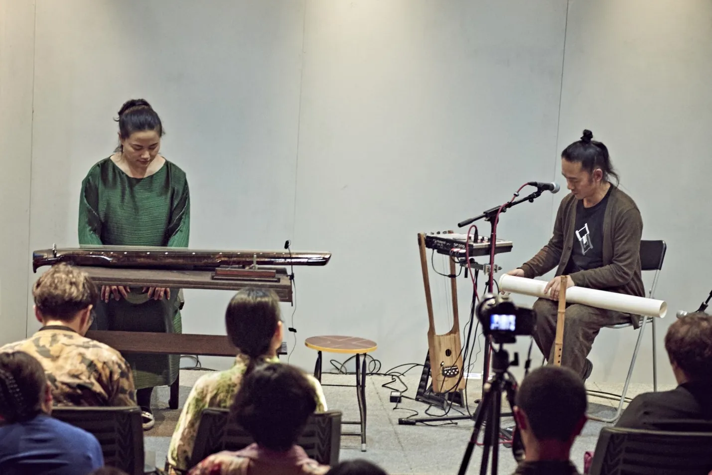 two artists playing instruments at beijing center
