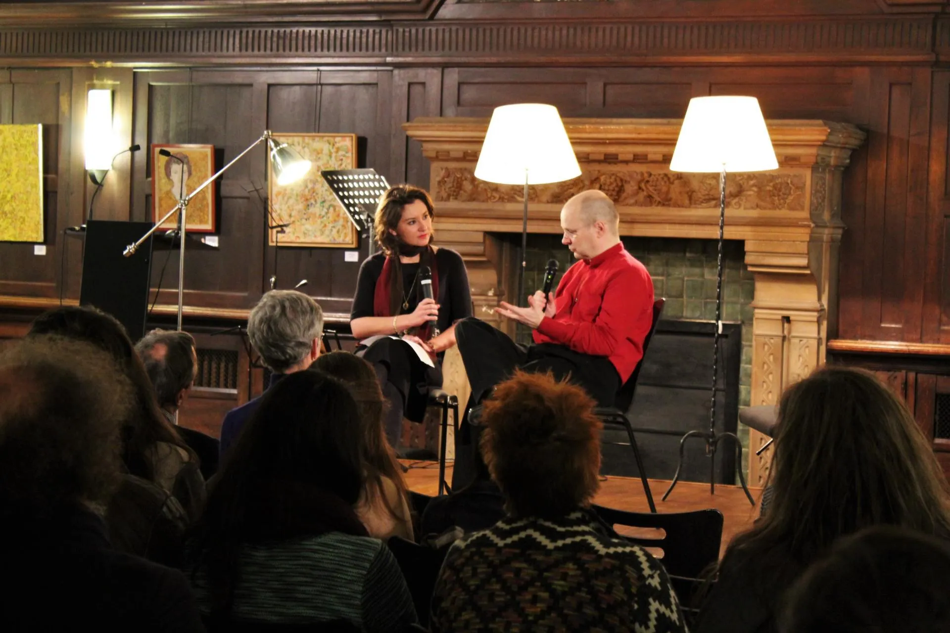 people on stage in discussion at the paris center