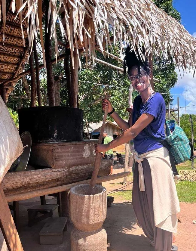woman with mortar and pestle
