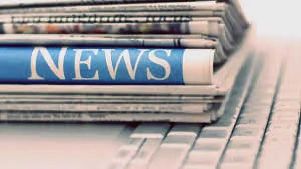 newspapers on a keyboard