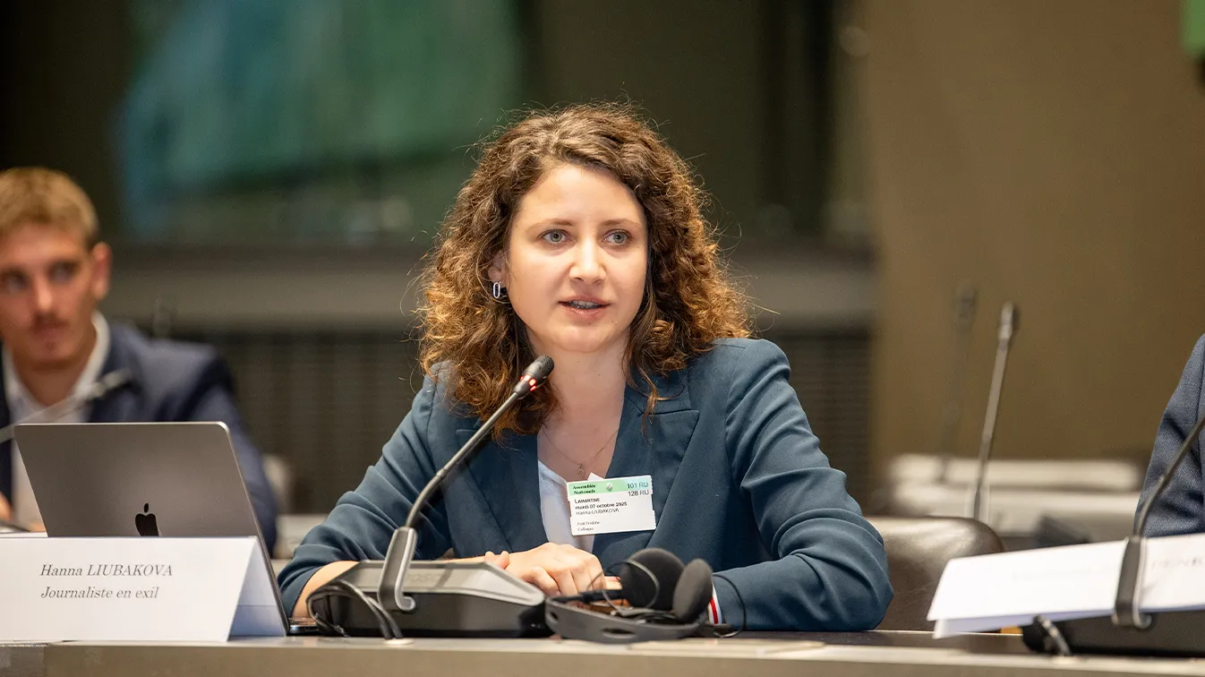 Hanna Liubakova speaking at the Assemblé Nationale