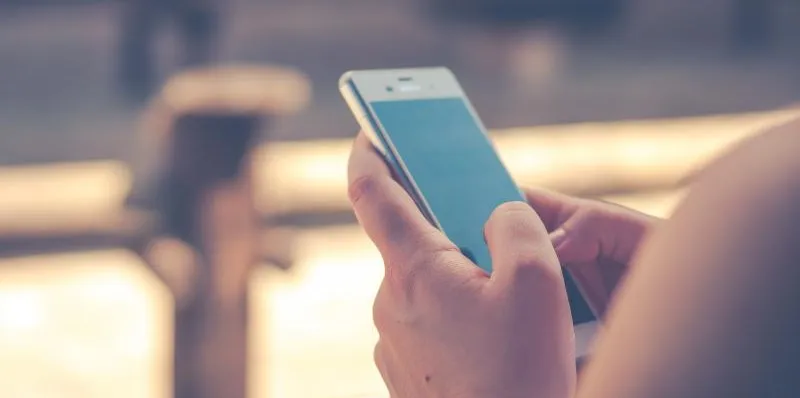 Woman using mobile phone