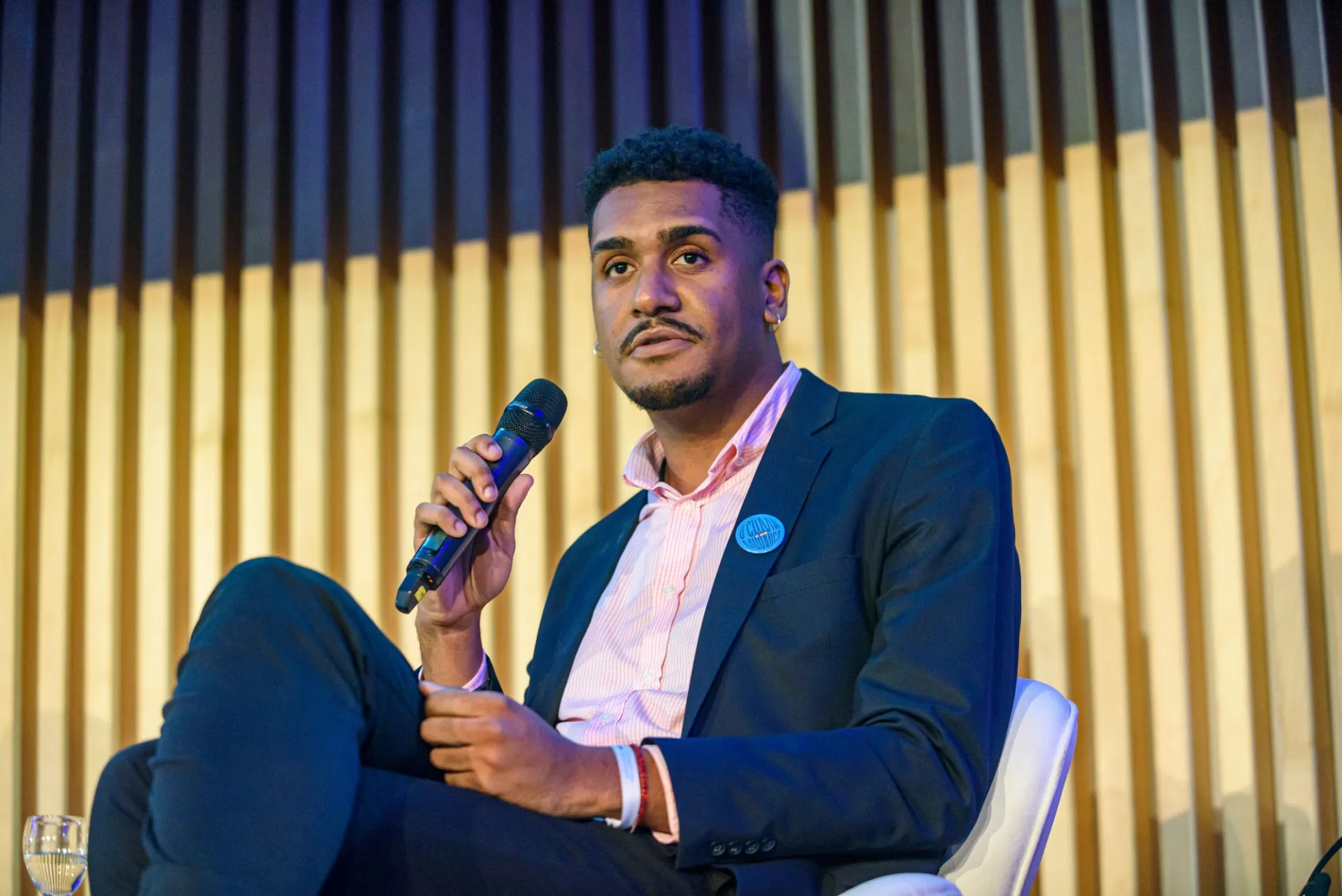 Thiago Nascimento, a youth leader from Jacarezinho, and co-founder of LabJaca, during the Climate Hub Rio launch event. Photo: Fabio Cordeiro