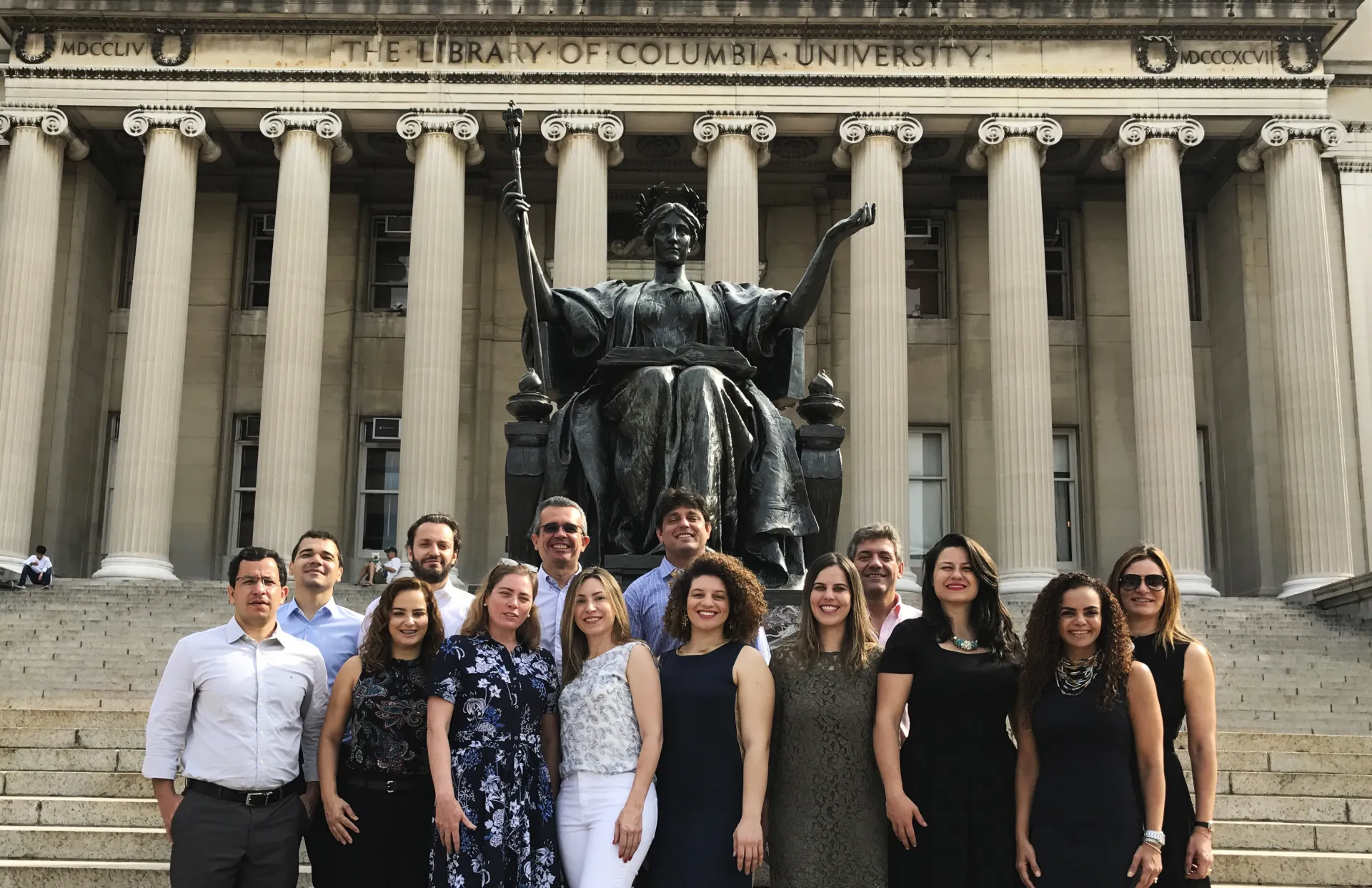 Leadership in a Challenging Century class in front of Alma Mater