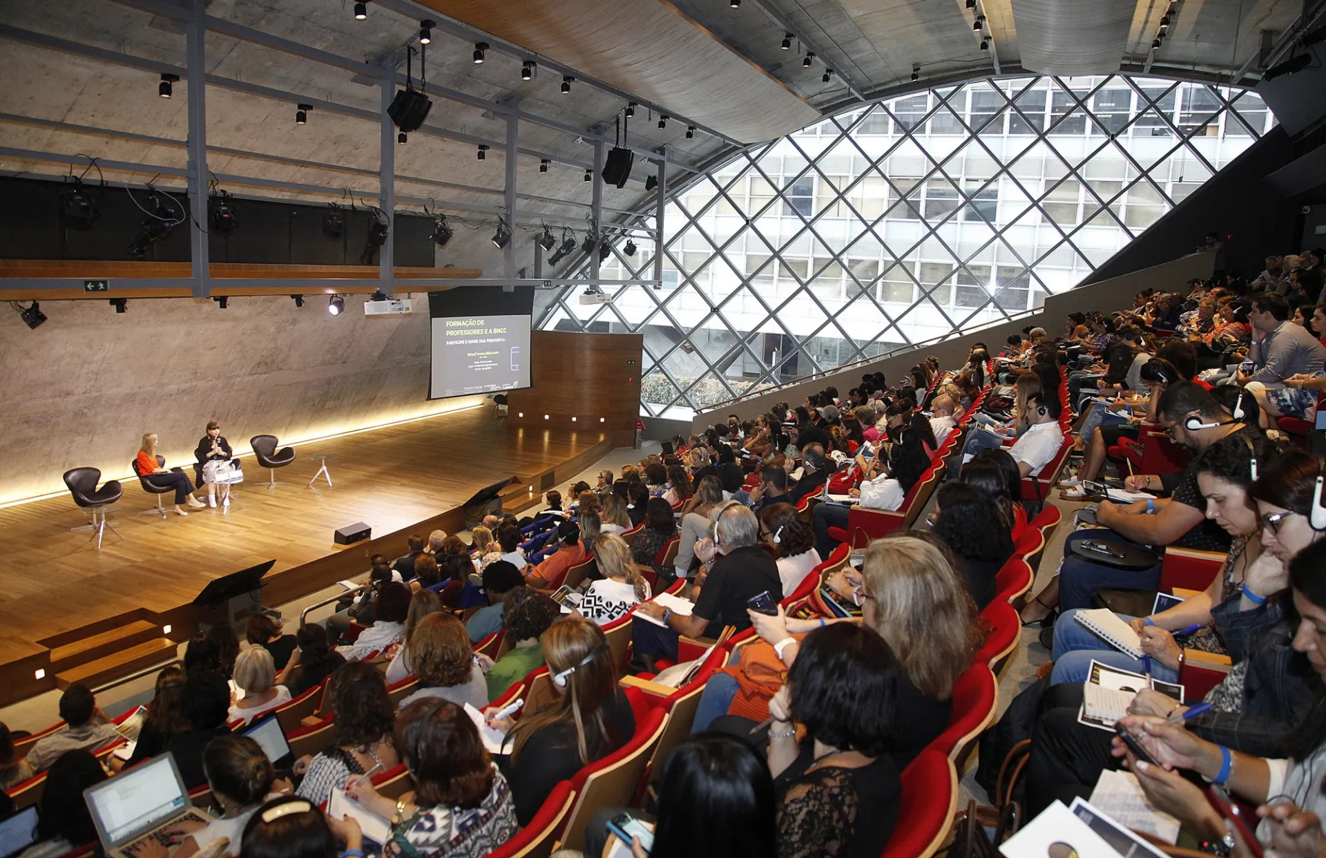 Picture from Rio Center's 5th anniversary on March 2018. The photo shows a full-house audience