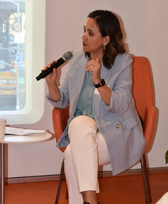 Professor Mashura Akilova moderates the leadership panel discussion.
